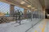 Secure indoor bicycle storage area with ample bike racks and natural lighting, perfect for active urban living.