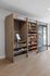 Modern apartment amenity featuring a self-service snack and beverage station with checkout kiosk.