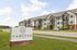Charming and modern apartment complex 'The Carlyle at Chatham Hills' in Westfield, featuring elegant architecture and well-maintained landscaping.