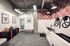 Chic pet-friendly amenity space featuring modern dog wash stations, colorful wall art, and convenient storage solutions.