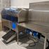 Modern pet washing station with stainless steel design, featuring a convenient ramp and powerful drying system.