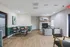 Inviting living area featuring elegant seating, modern fireplace, and stylish decor for a cozy ambiance.