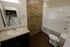 Illinois Street Senior - Bathroom with Brick Wall