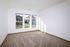 Minnie Hartmann - Bright Carpeted Room