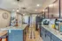 Elegant kitchen with granite countertops, modern appliances, and stylish pendant lighting, creating a perfect blend of functionality and sophistication.