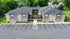 Modern apartment complex with elegant architecture, lush green surroundings, and spacious parking area.
