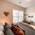 Decorated bedroom with desk at Incite at Troy | Student Apartments in Troy, NY
