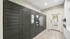 Modern apartment mailroom with sleek, secure parcel lockers and inviting natural lighting.