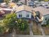 Charming suburban apartment complex featuring modern architecture, lush greenery, and ample parking spaces.