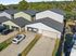 Modern duplex homes with spacious driveways and serene suburban surroundings, ideal for family living.