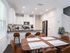 Modern kitchen with stainless steel appliances at Old Row at Eastwood