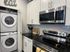 Stainless steel appliances and washer and dryer at Old Row at Eastwood