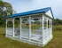 Charming white gazebo with a blue roof overlooking a serene pond, perfect for relaxing and enjoying the surrounding lush greenery.