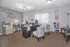 Inviting office space at Terra Trace with modern decor, elegant lighting, and a cozy seating area.