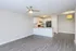 Bright modern kitchen with sleek cabinetry, stainless steel appliances, and elegant wood flooring, perfect for entertaining.