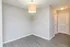 Inviting corner space with modern wooden flooring and elegant lighting, ideal for customization in your new home.