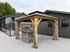 Chic outdoor space featuring a modern gazebo with a built-in grill, perfect for entertaining by the poolside.
