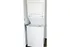 Compact laundry area featuring a sleek stackable washer and dryer, ideal for efficient living spaces.