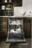 Modern kitchen with stylish cabinetry and an open dishwasher showcasing clean dishes, set against a sleek backsplash.