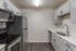 Modern kitchen with sleek stainless steel appliances, elegant cabinetry, and spacious countertops.