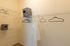 Spacious walk-in closet with organized shelving and ample hanging space, perfect for a clutter-free living.