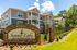 Summer Lake Luxury Apartment Homes with modern architecture, manicured landscaping, and vibrant surroundings.