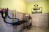 Bright and inviting pet grooming station with stainless steel wash tub and modern amenities, perfect for pampering your furry friends.