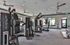 Modern fitness center with advanced workout machines, natural light, and spacious interiors.
