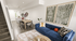 Bright and modern open-concept living area featuring a cozy blue velvet sofa, elegant dining table, and stylish decor with contemporary artwork.