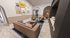 Chic and stylish living room featuring modern art, comfortable seating, elegant kitchen bar area, and warm wood flooring.