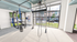 Bright, modern gym space featuring state-of-the-art weightlifting equipment and expansive windows with a scenic view.