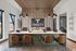 Modern reception area at Trinity Estancia with stylish wood accents, elegant lighting, and inviting seating.