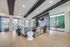 Luxurious living room featuring modern decor, stylish furniture, and large windows offering a bright, open atmosphere.