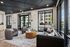 Elegant and modern lobby with plush seating, contemporary decor, and large windows offering abundant natural light.