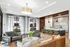 Modern and inviting lobby area with sleek seating, elegant lighting, and large windows at Ellison Cool Springs.