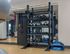Modern fitness center equipped with a diverse range of exercise equipment including kettlebells, resistance bands, and medicine balls for a complete workout experience.