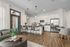 Modern apartment interior with sleek open-concept kitchen, stainless steel appliances, and elegant living area.