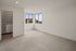 Bright, spacious bedroom with a large walk-in closet and scenic windows offering beautiful natural light.
