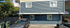 Charming two-story residence with navy blue siding and convenient parking. Nestled in a peaceful neighborhood, perfect for comfortable living.