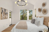 Bright and airy bedroom with modern decor, large windows showcasing lush greenery, and elegant lighting for a serene ambiance.