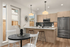 Chic kitchen and dining area with modern appliances, stylish pendant lighting, and elegant wooden cabinetry.