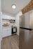 Chic modern kitchen with sleek stainless steel appliances and elegant cabinetry, perfect for culinary enthusiasts.