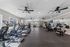 Bright, modern fitness center with state-of-the-art treadmills and exercise machines, perfect for a healthy lifestyle.