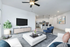 Modern open-concept living room with stylish decor, flat-screen TV, and elegant kitchen featuring sleek bar seating.