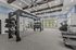 State-of-the-art fitness center with sleek TRX equipment, modern treadmills, and expansive windows offering scenic views.