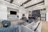 Modern and inviting living area with stylish decor, spacious seating, and chic lighting, perfect for entertaining guests.