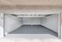 Spacious single-car garage with sleek, freshly painted floors and bright, modern interior.