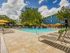 Pool with lounge chairs.