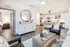 Living area with chairs and coffee table.