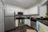 Kitchen with stainless steel appliances.